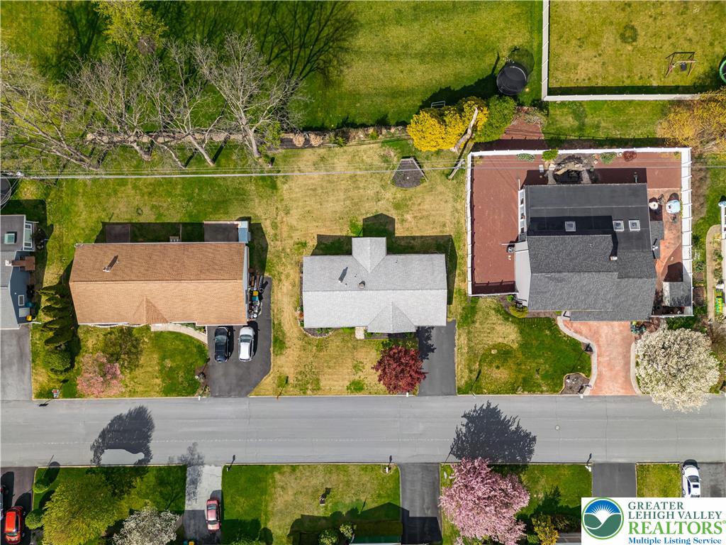 2141 Aster Road Lower Macungie Township, PA 18062 - Photo 19 of 62 an aerial view of a house with a outdoor space