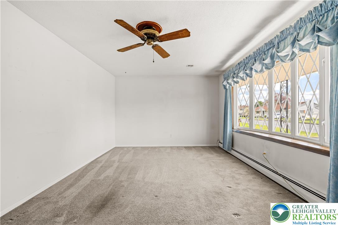 2141 Aster Road Lower Macungie Township, PA 18062 - Photo 23 of 62 wooden floor in an empty room with a window