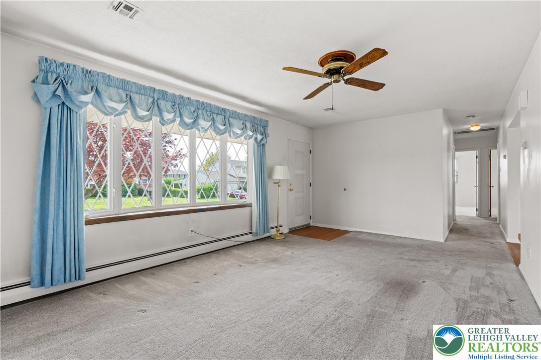 2141 Aster Road Lower Macungie Township, PA 18062 - Photo 24 of 62 wooden floor in an empty room with a window