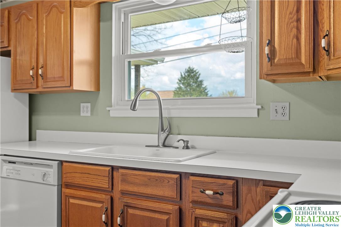 2141 Aster Road Lower Macungie Township, PA 18062 - Photo 36 of 62 a kitchen with a sink and a window