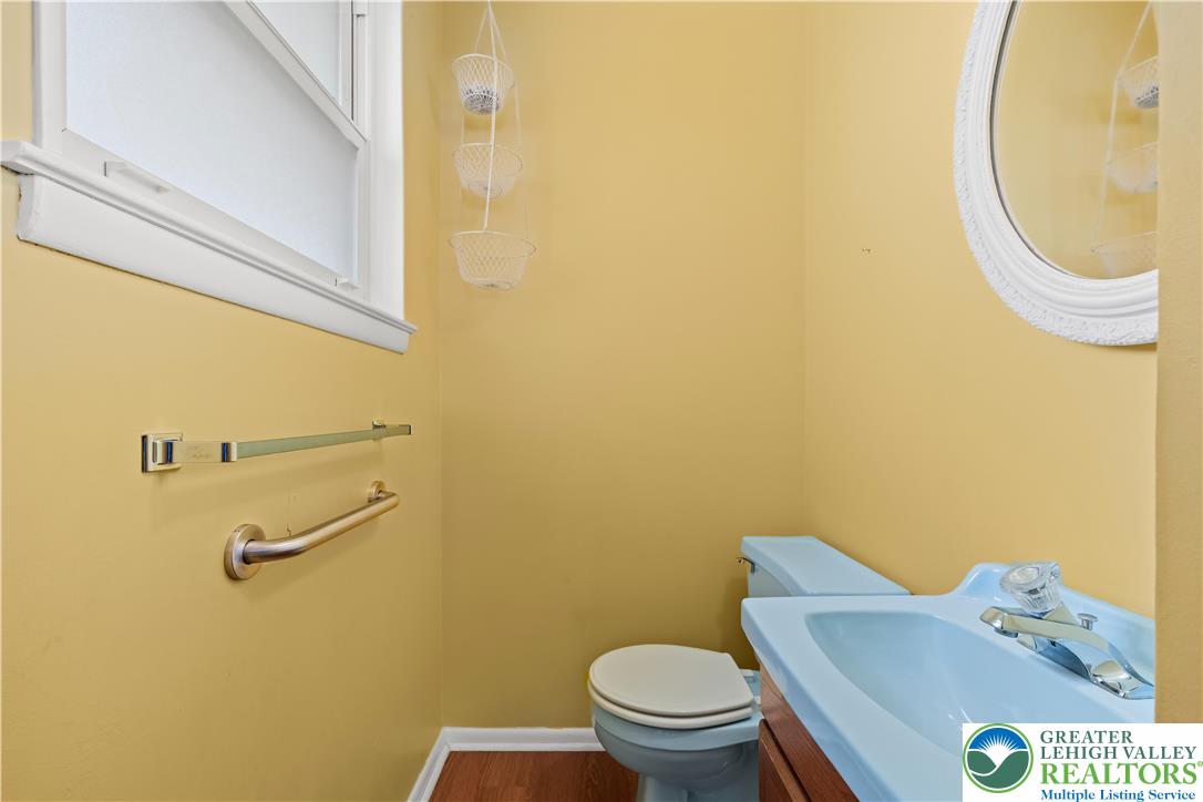 2141 Aster Road Lower Macungie Township, PA 18062 - Photo 41 of 62 a bathroom with a toilet and a sink