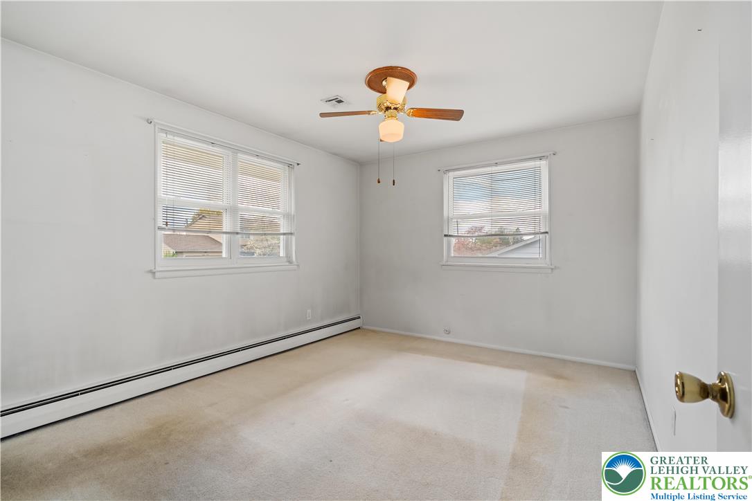 2141 Aster Road Lower Macungie Township, PA 18062 - Photo 43 of 62 a view of an empty room with a window