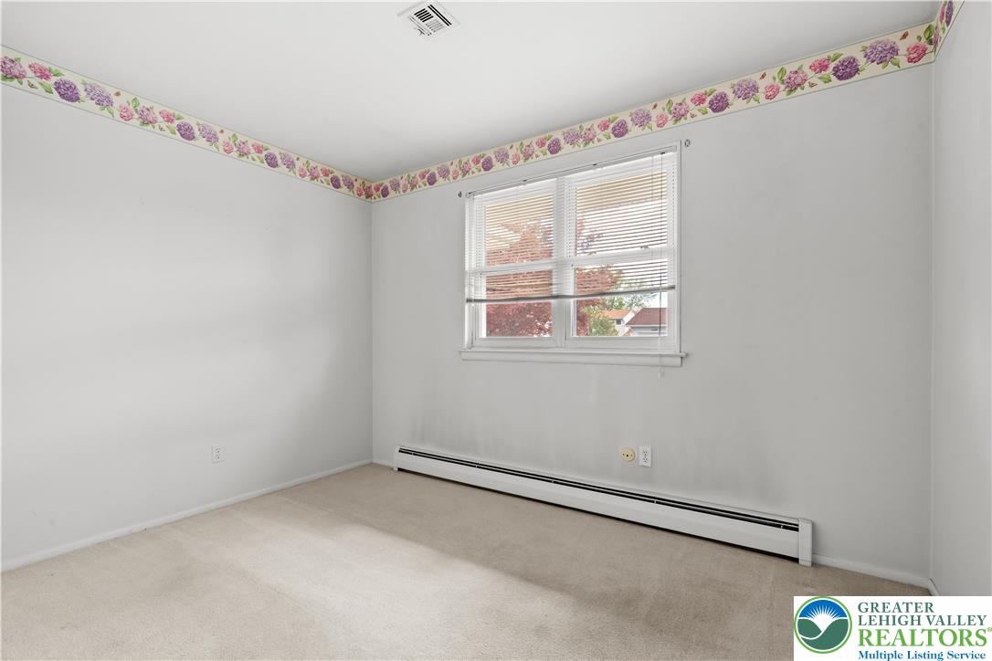 2141 Aster Road Lower Macungie Township, PA 18062 - Photo 45 of 62 a very nice looking room with a window