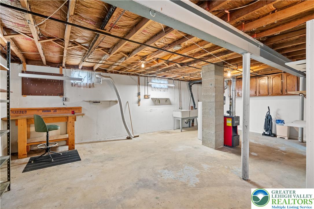 2141 Aster Road Lower Macungie Township, PA 18062 - Photo 58 of 62 a view of a room with wooden furniture