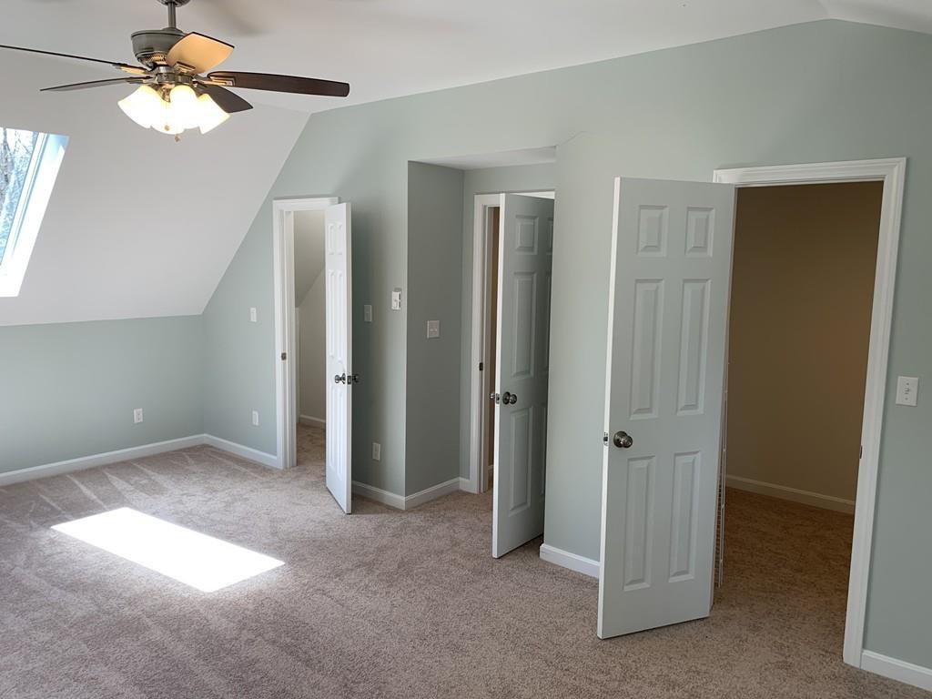 77 May Brook Road Holland, MA 01521 - Photo 14 of 23 a view of empty room with a ceiling fan