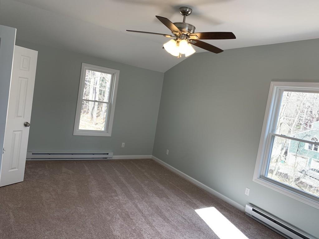 77 May Brook Road Holland, MA 01521 - Photo 15 of 23 a view of an empty room with a window