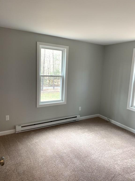 77 May Brook Road Holland, MA 01521 - Photo 17 of 23 an empty room with a window
