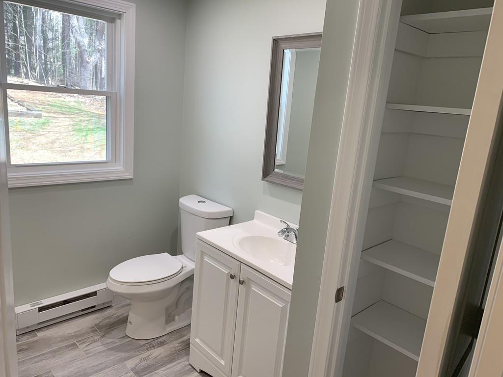 77 May Brook Road Holland, MA 01521 - Photo 21 of 23 a bathroom with a sink and a toilet