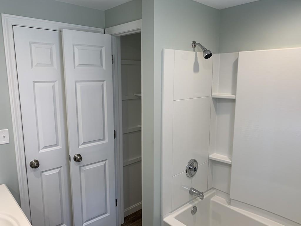77 May Brook Road Holland, MA 01521 - Photo 23 of 23 a bathroom with a shower and a tub