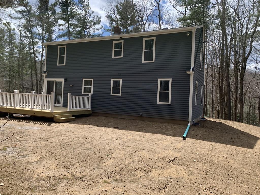77 May Brook Road Holland, MA 01521 - Photo 4 of 23 a view of backyard of house