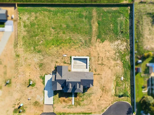 a balcony with table and chairs