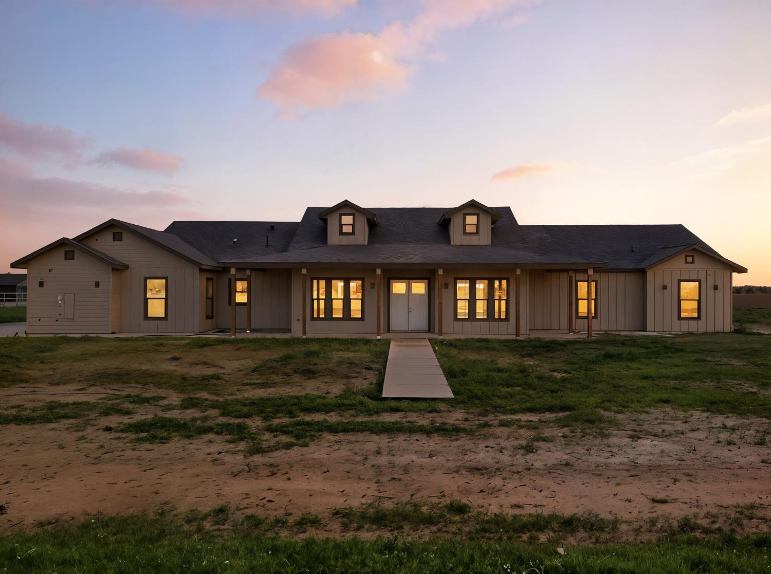 605 South Anderson Road Exeter, CA 93221 - Photo 4 of 13 a front view of a house with a yard