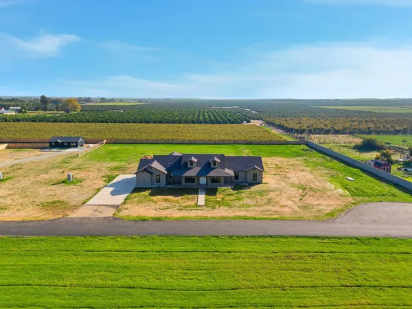 a view of a lake with a big yard