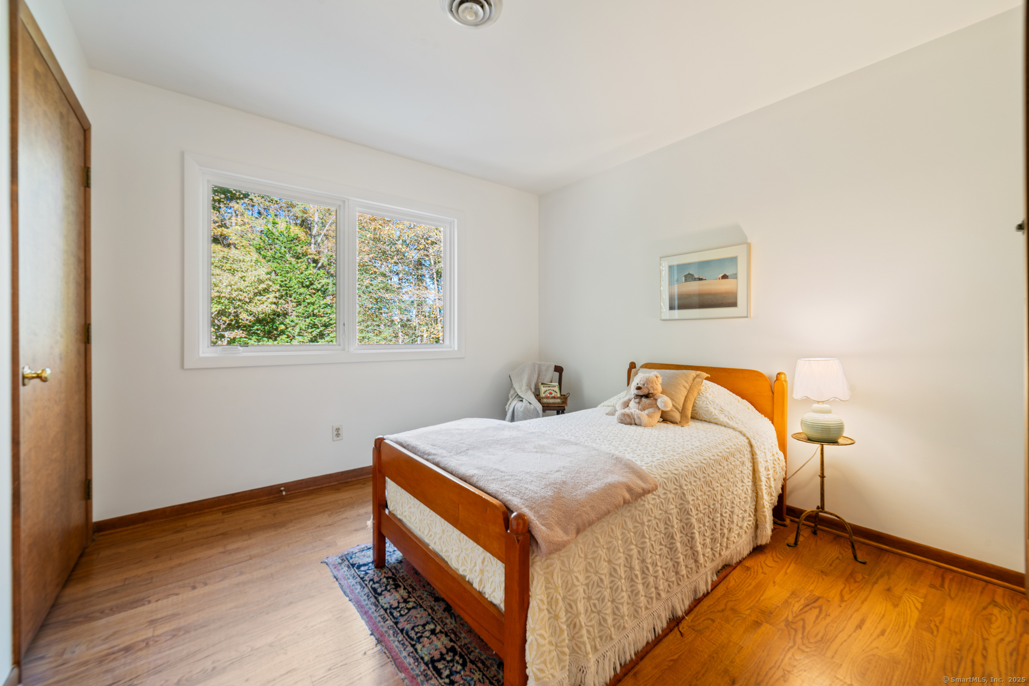 34 Echo Valley Road Newtown, CT 06470 - Photo 30 of 40 a bed room with a bed and a window