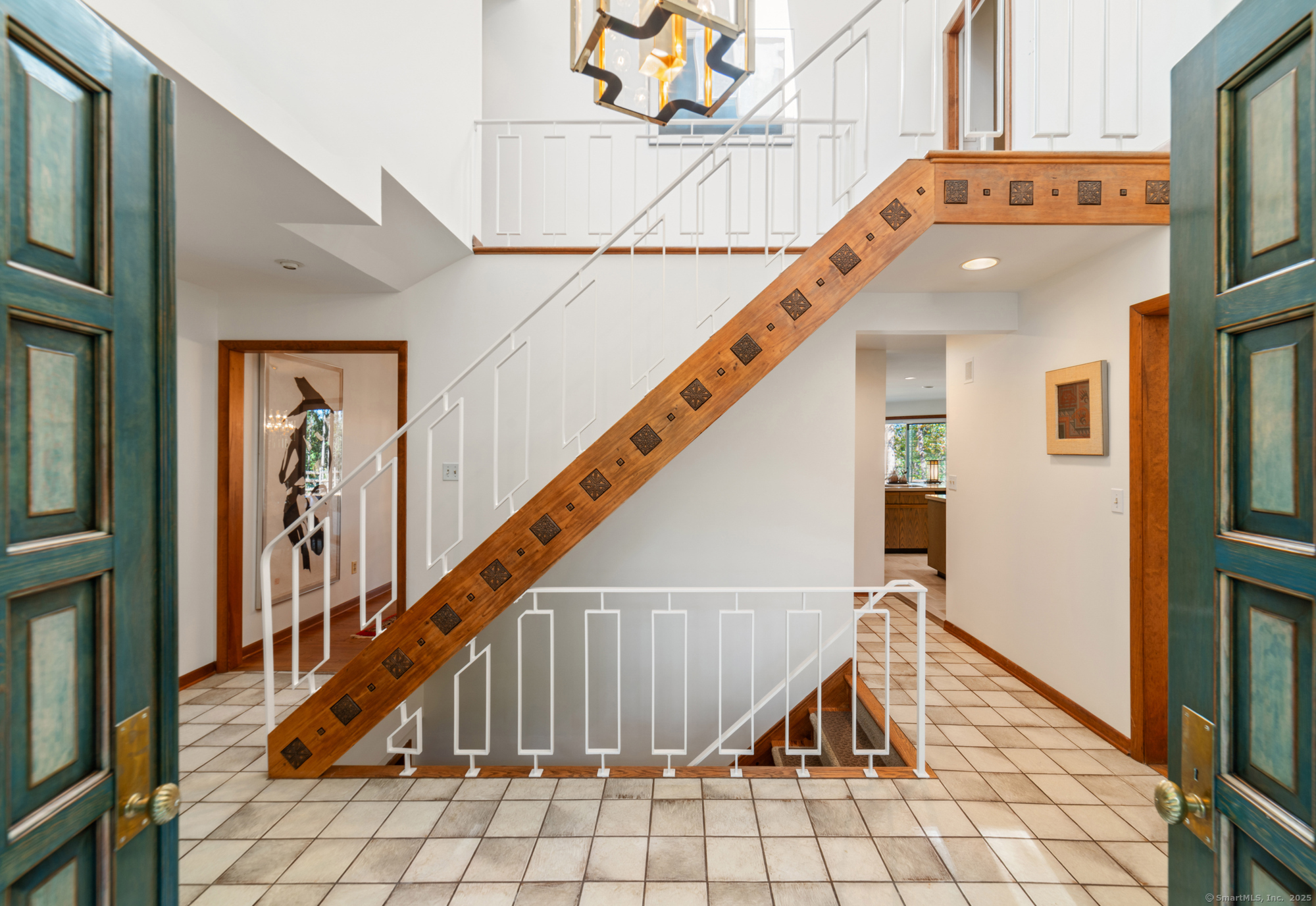 34 Echo Valley Road Newtown, CT 06470 - Photo 3 of 40 a view of entryway with wooden floor and stairs