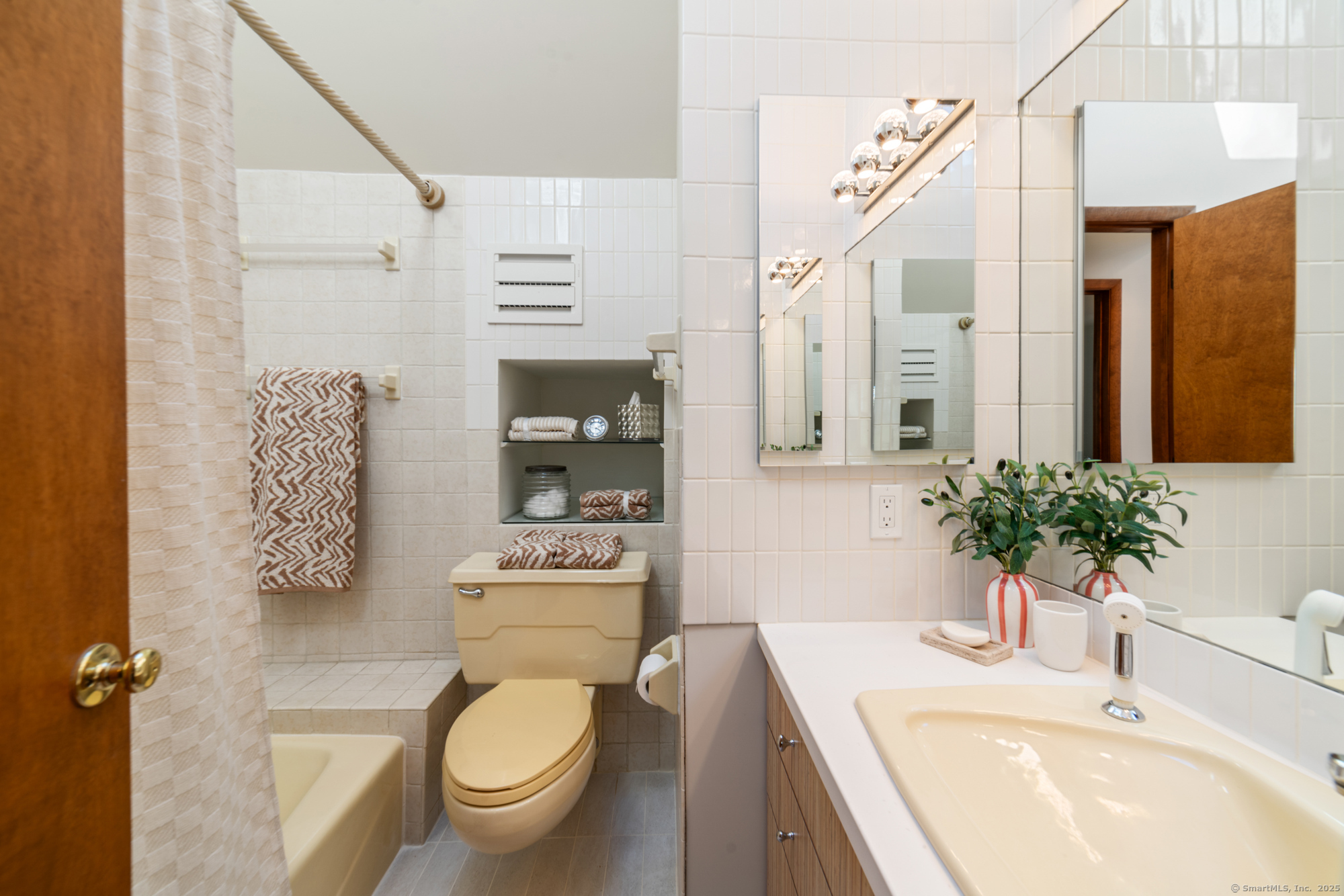 34 Echo Valley Road Newtown, CT 06470 - Photo 31 of 40 a bathroom with a sink a toilet and shower