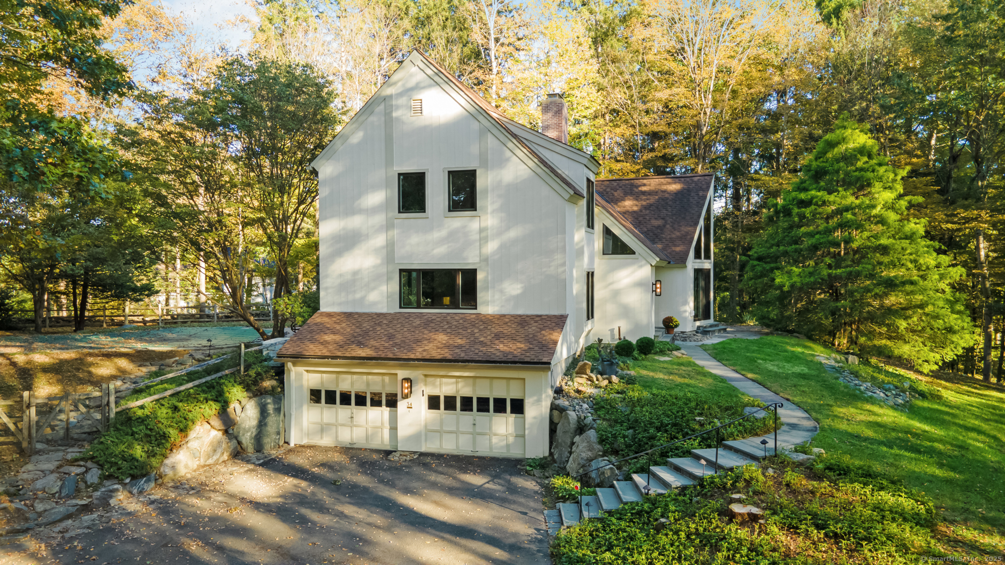 34 Echo Valley Road Newtown, CT 06470 - Photo 34 of 40 a view of house with outdoor space and sitting area