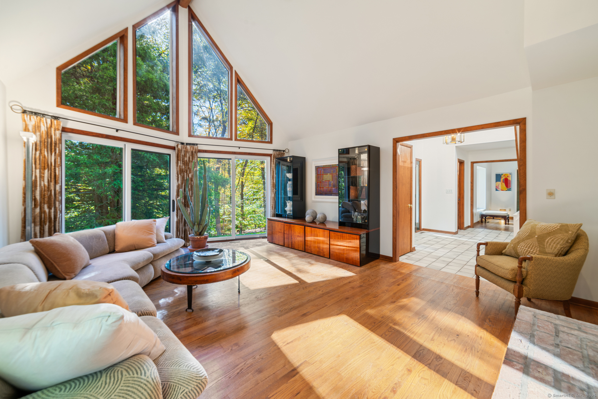 34 Echo Valley Road Newtown, CT 06470 - Photo 9 of 40 a living room with furniture and a large window
