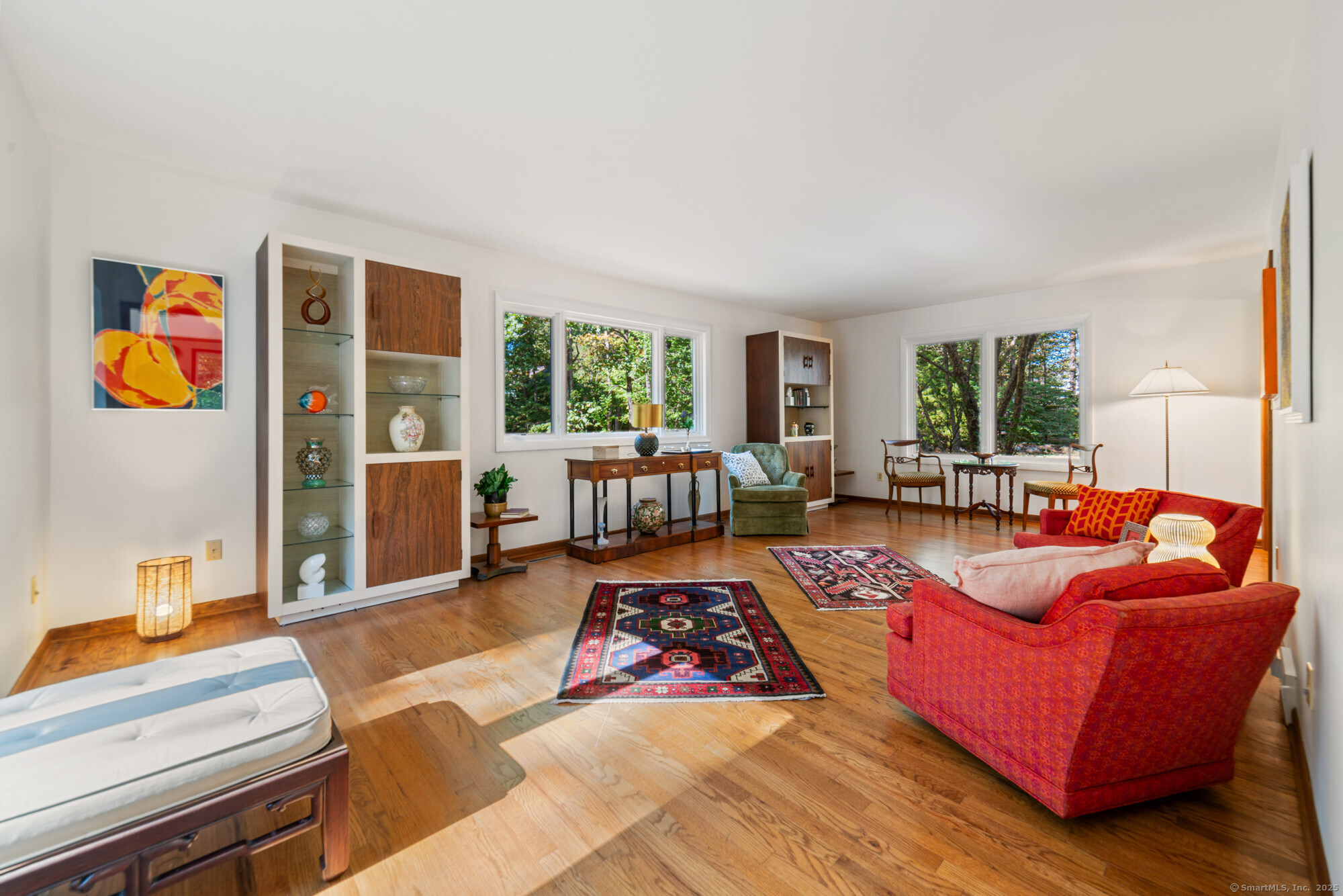 34 Echo Valley Road Newtown, CT 06470 - Photo 10 of 40 a living room with furniture fireplace and window