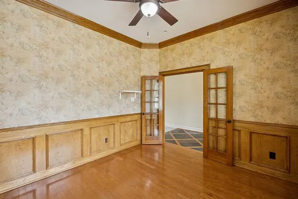 a view of an empty room with a fireplace