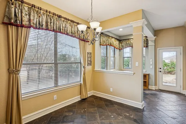 a view of a room with windows