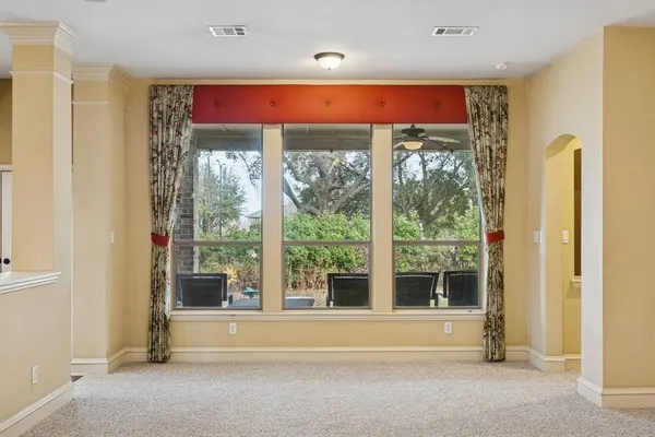 a view of front door with yard