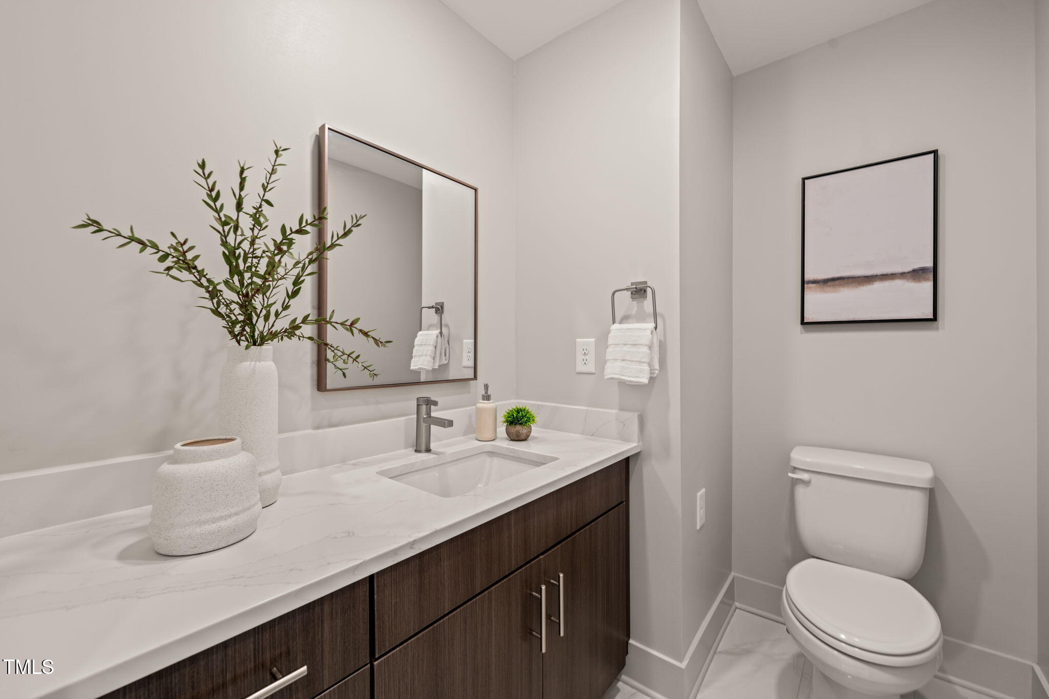 11801 Old Creedmoor Road Raleigh, NC 27613 - Photo 20 of 52 a bathroom with a toilet a sink and mirror