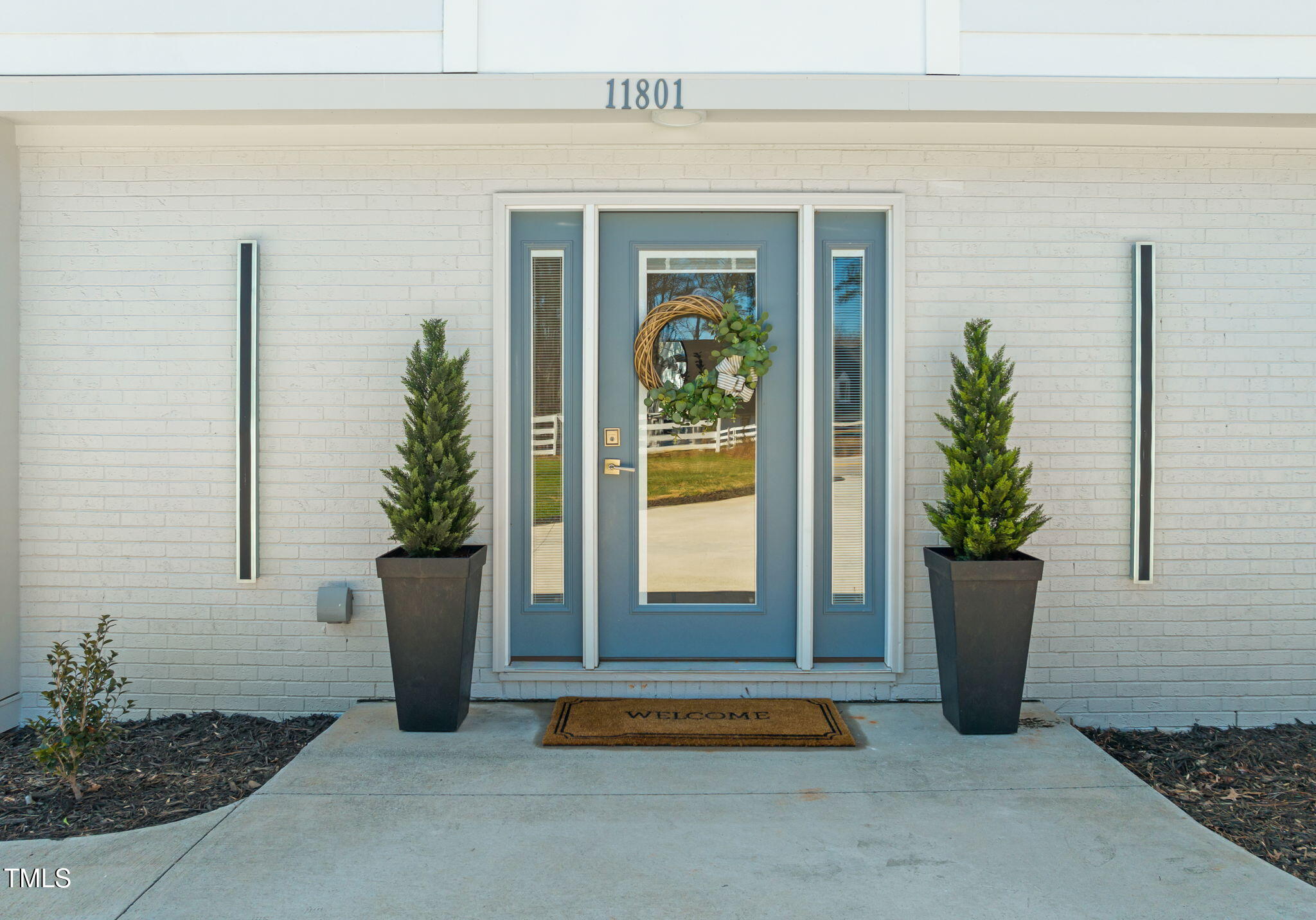 11801 Old Creedmoor Road Raleigh, NC 27613 - Photo 2 of 52 a view of a entryway door of the house