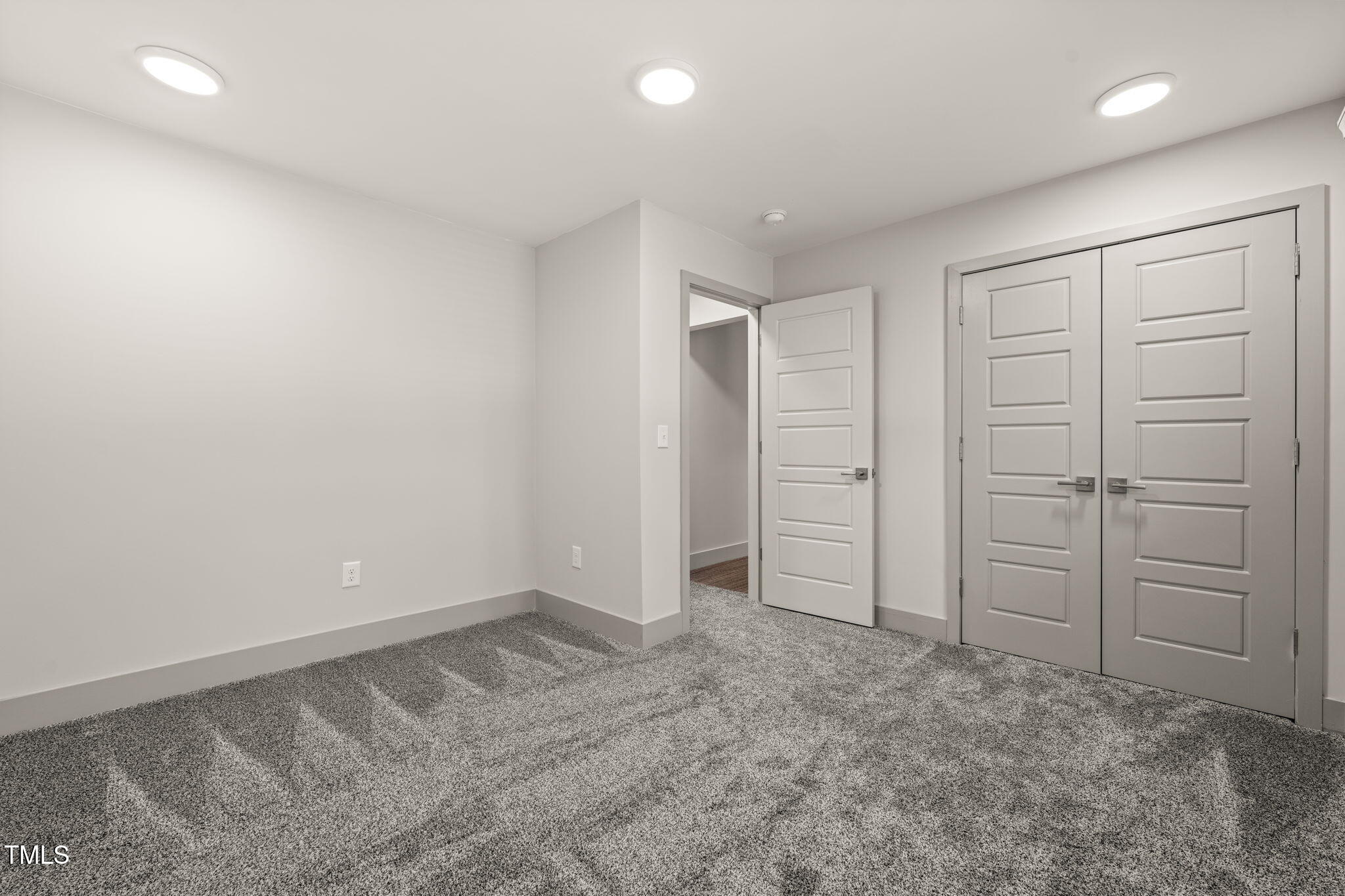 11801 Old Creedmoor Road Raleigh, NC 27613 - Photo 28 of 52 an empty room with closet area