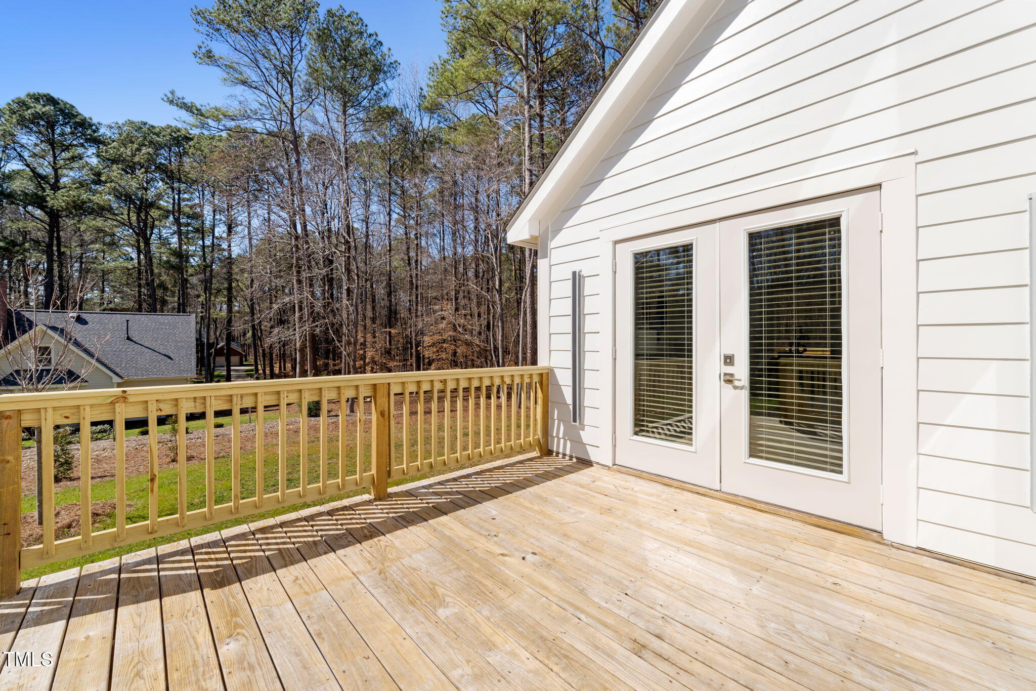 11801 Old Creedmoor Road Raleigh, NC 27613 - Photo 37 of 52 a view of a wooden deck