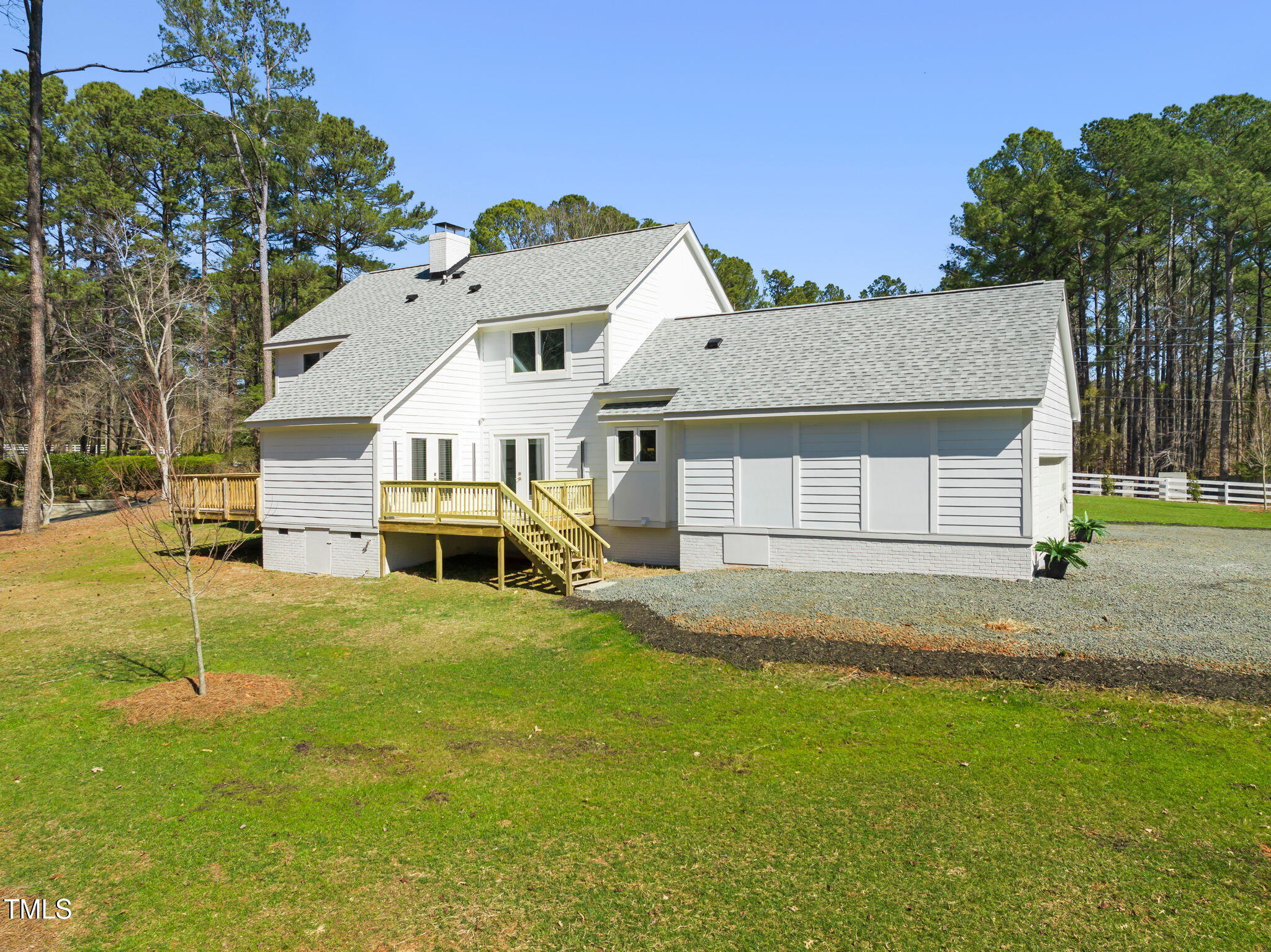 11801 Old Creedmoor Road Raleigh, NC 27613 - Photo 40 of 52 a view of a house with a yard and garage