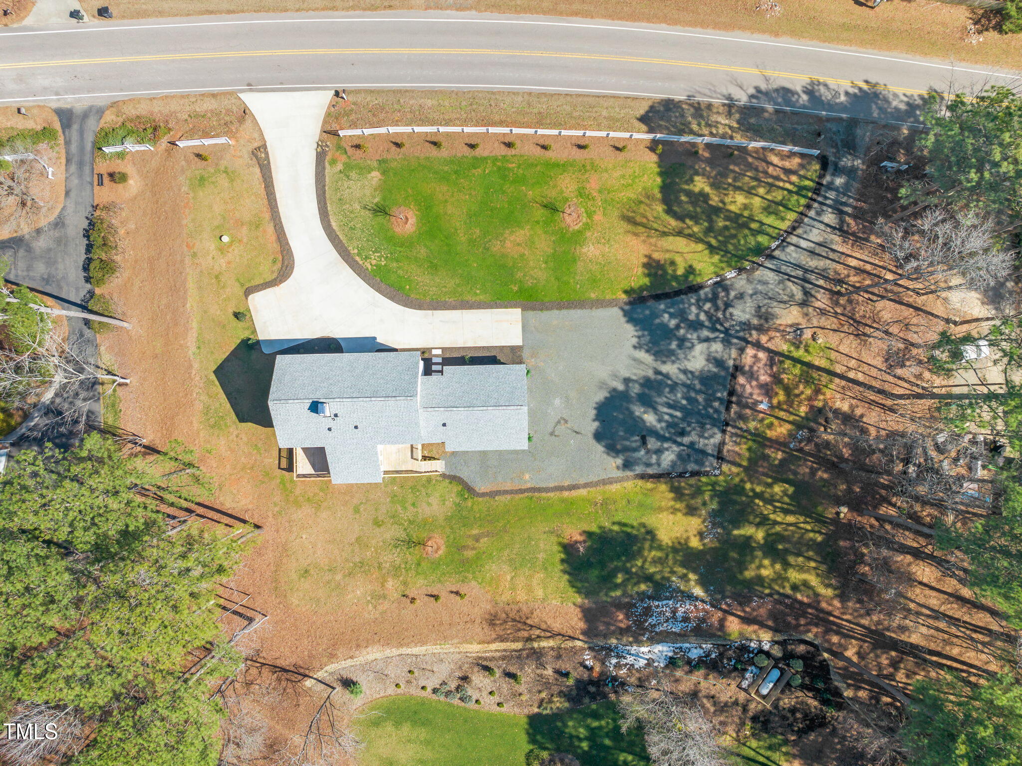 11801 Old Creedmoor Road Raleigh, NC 27613 - Photo 46 of 52 an aerial view of a house with a swimming pool