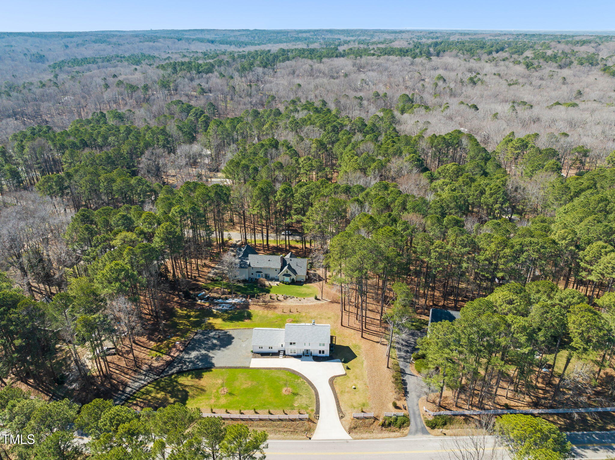 11801 Old Creedmoor Road Raleigh, NC 27613 - Photo 47 of 52 an aerial view of a house with a yard