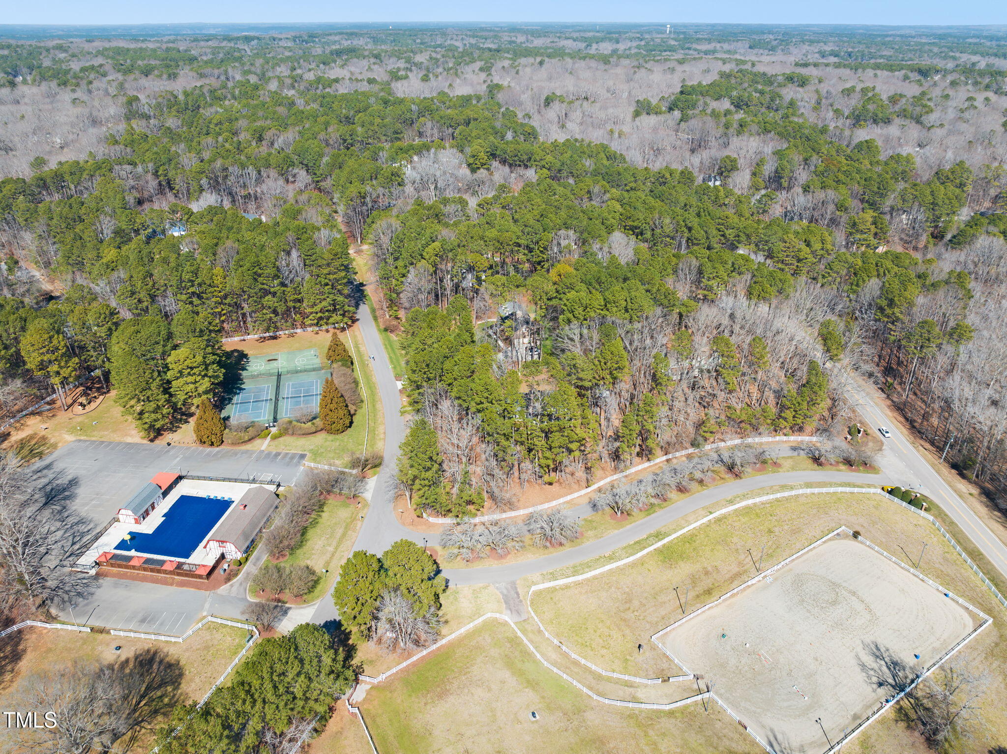 11801 Old Creedmoor Road Raleigh, NC 27613 - Photo 49 of 52 an aerial view of a house with a swimming pool