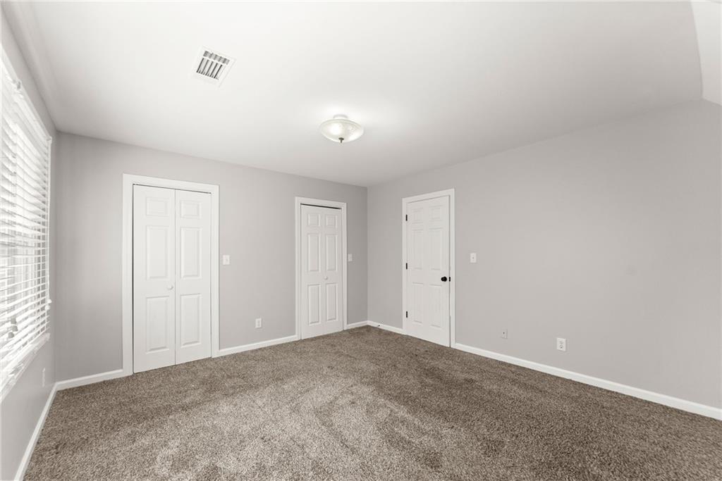 3523 Lighthouse Lane Gainesville, GA 30504 - Photo 33 of 72 a view of an empty room and a window