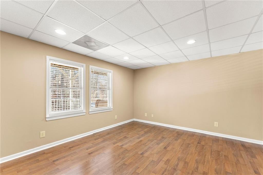 3523 Lighthouse Lane Gainesville, GA 30504 - Photo 45 of 72 a view of empty room with wooden floor and fan