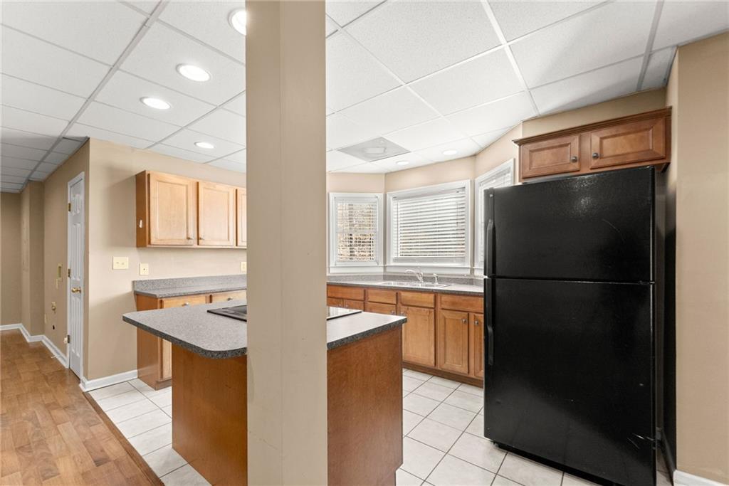 3523 Lighthouse Lane Gainesville, GA 30504 - Photo 52 of 72 a kitchen with stainless steel appliances granite countertop a refrigerator and a sink