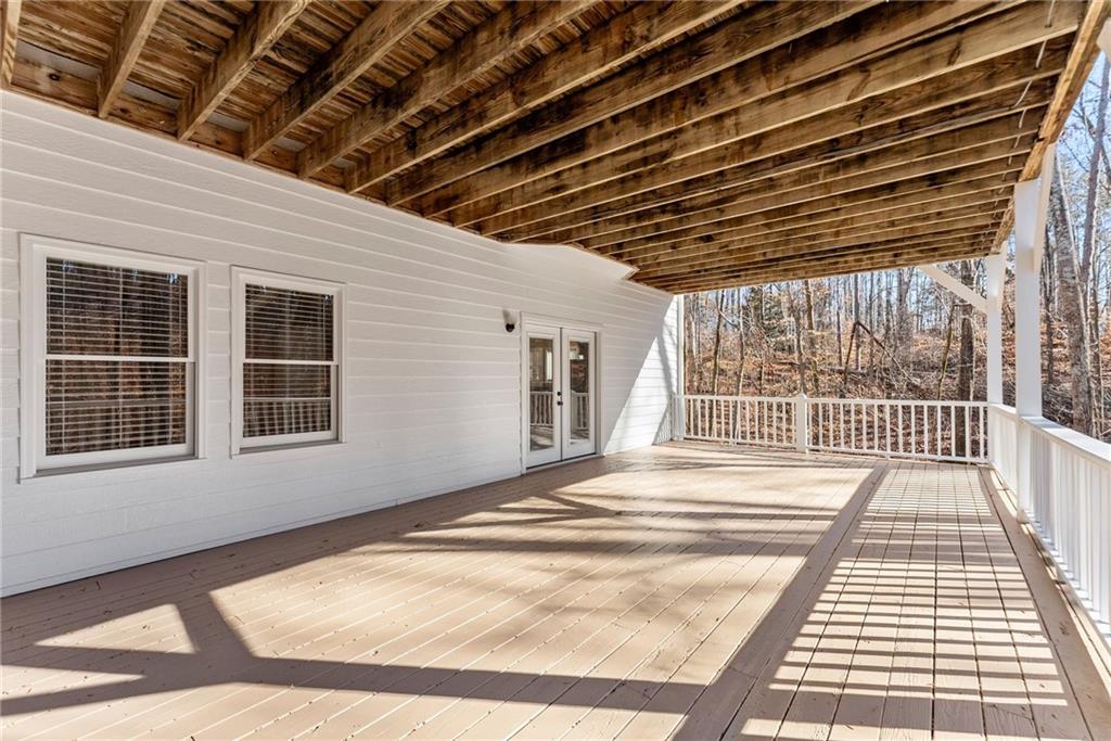3523 Lighthouse Lane Gainesville, GA 30504 - Photo 57 of 72 a view of a backyard of a house with wooden floor