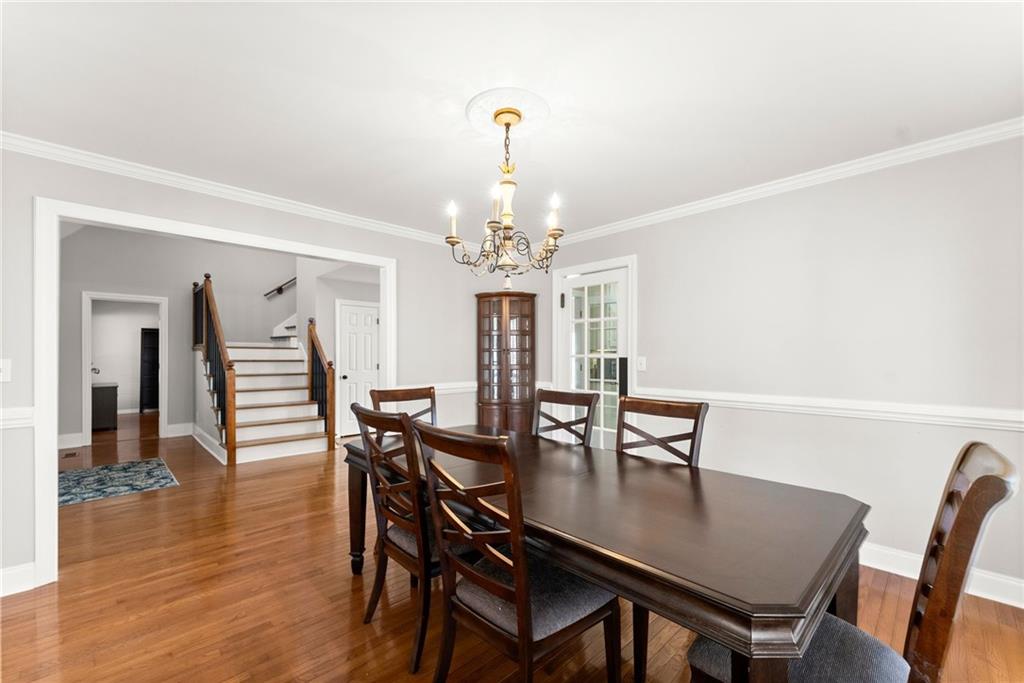 3523 Lighthouse Lane Gainesville, GA 30504 - Photo 9 of 72 a view of a dining room with furniture and wooden floor