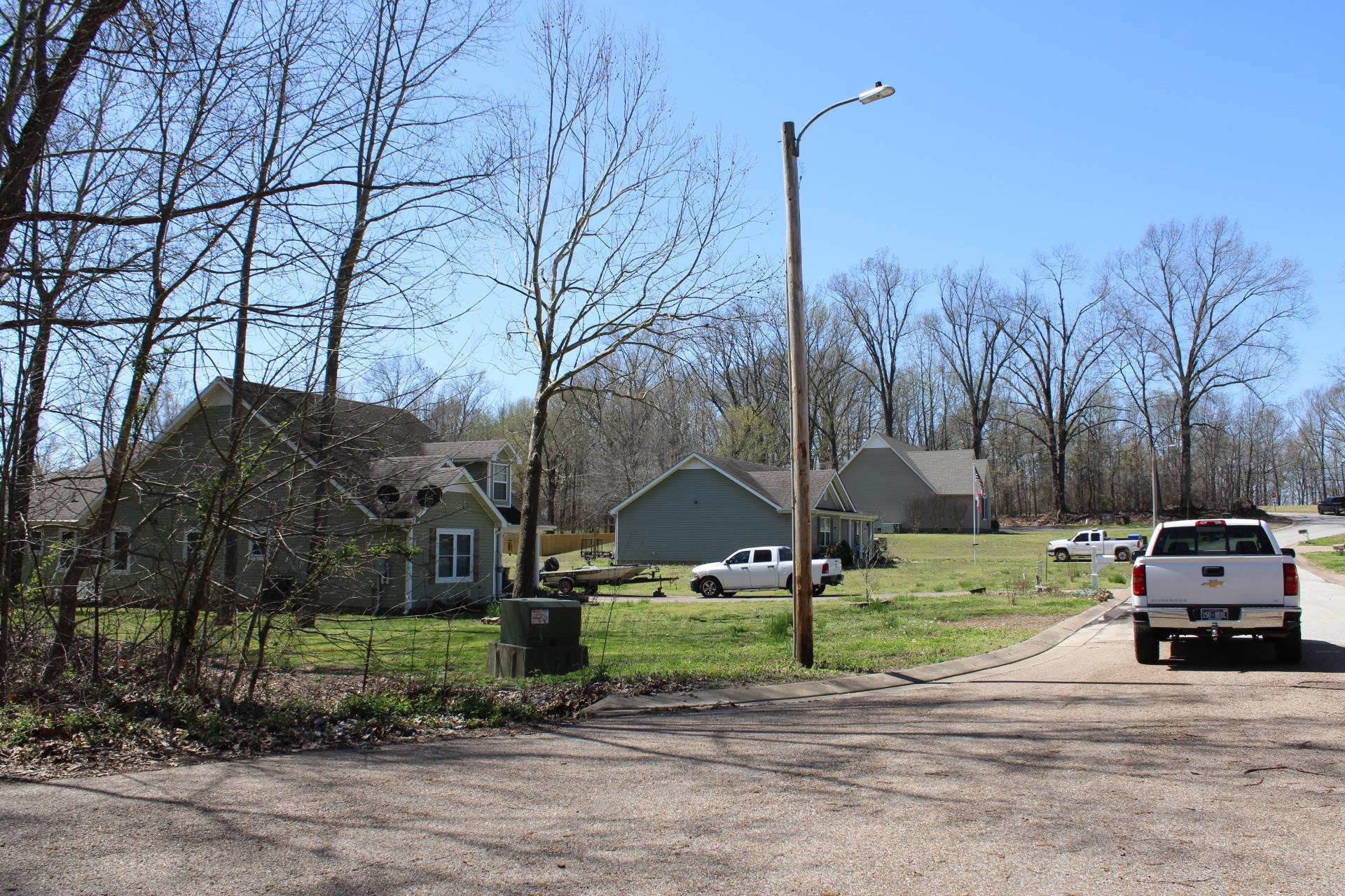 Lot 24 Walnut Ridge Ripley, TN 38063 - Photo 3 of 3 a view of a car parked on the side of the road
