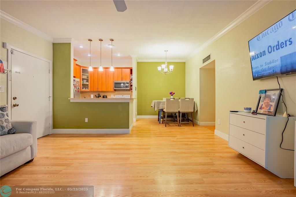 9614 West McNab Road, Unit 204 Tamarac, FL 33321 - Photo 2 of 37 a room with furniture and a large window