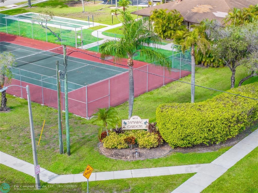 9614 West McNab Road, Unit 204 Tamarac, FL 33321 - Photo 23 of 37 a view of a backyard with plants