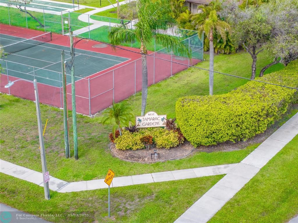 9614 West McNab Road, Unit 204 Tamarac, FL 33321 - Photo 24 of 37 a view of a backyard