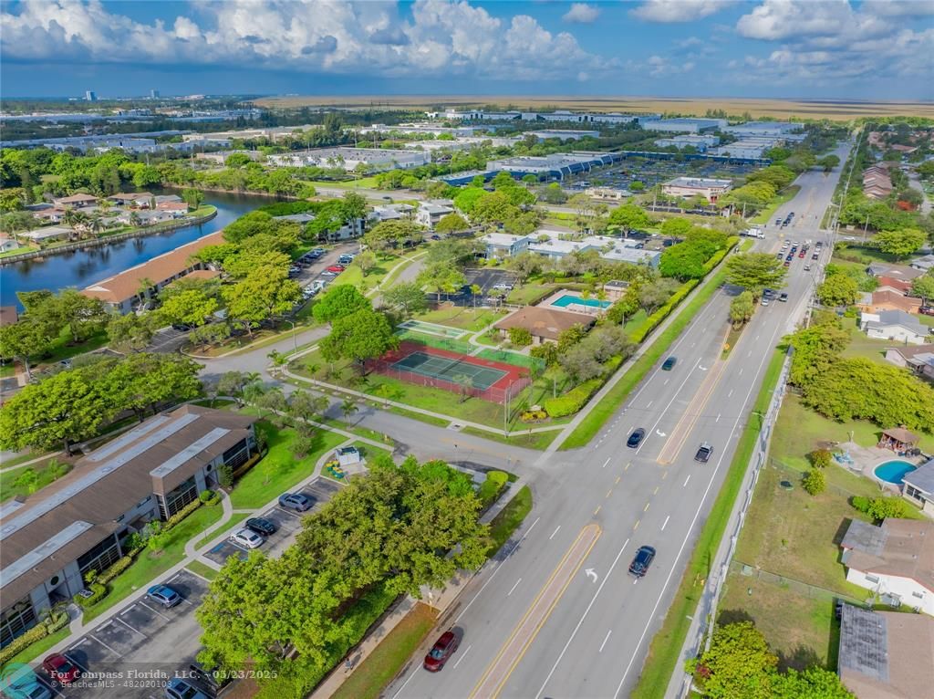 9614 West McNab Road, Unit 204 Tamarac, FL 33321 - Photo 31 of 37 a view of a city with an ocean