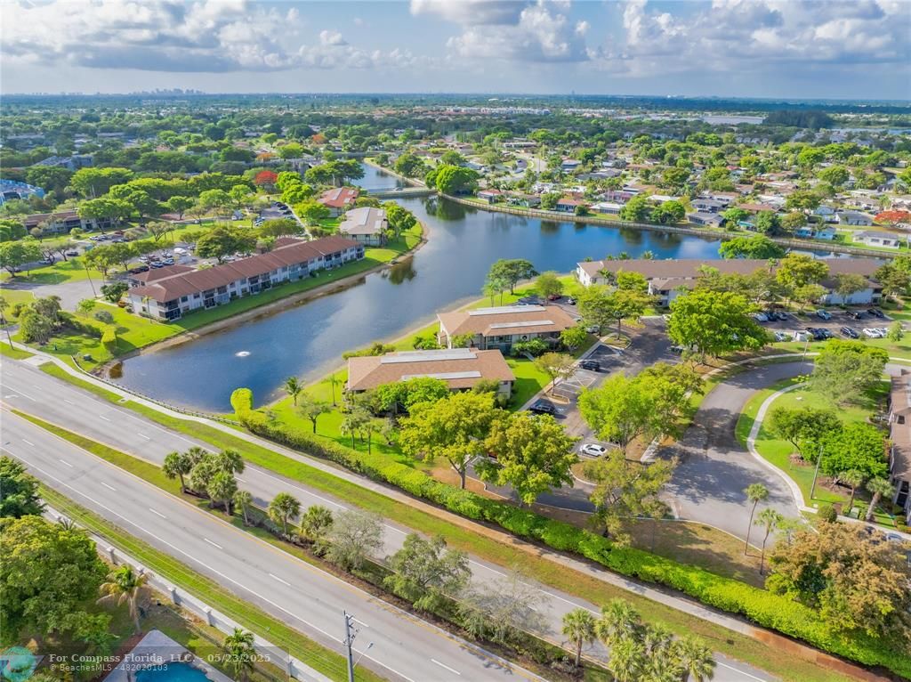 9614 West McNab Road, Unit 204 Tamarac, FL 33321 - Photo 32 of 37 a view of a city with ocean view