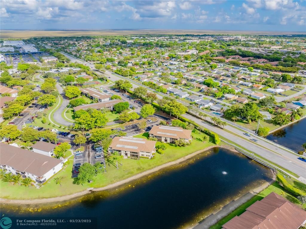 9614 West McNab Road, Unit 204 Tamarac, FL 33321 - Photo 35 of 37 a view of a balcony with an outdoor space