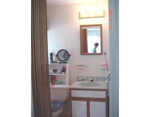 29 Griffin Road Framingham, MA 01701 - Photo 7 of 14 a bathroom with a sink and a mirror