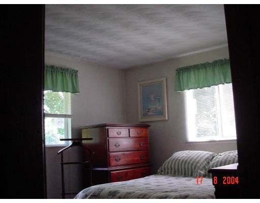 29 Griffin Road Framingham, MA 01701 - Photo 9 of 14 a bedroom with a bed and a window