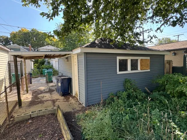 a backyard of a house with seating space