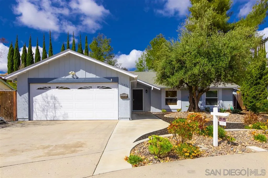 13856 Olive Grove Place Poway, CA 92064 - Photo 22 of 25 a front view of a house with garden